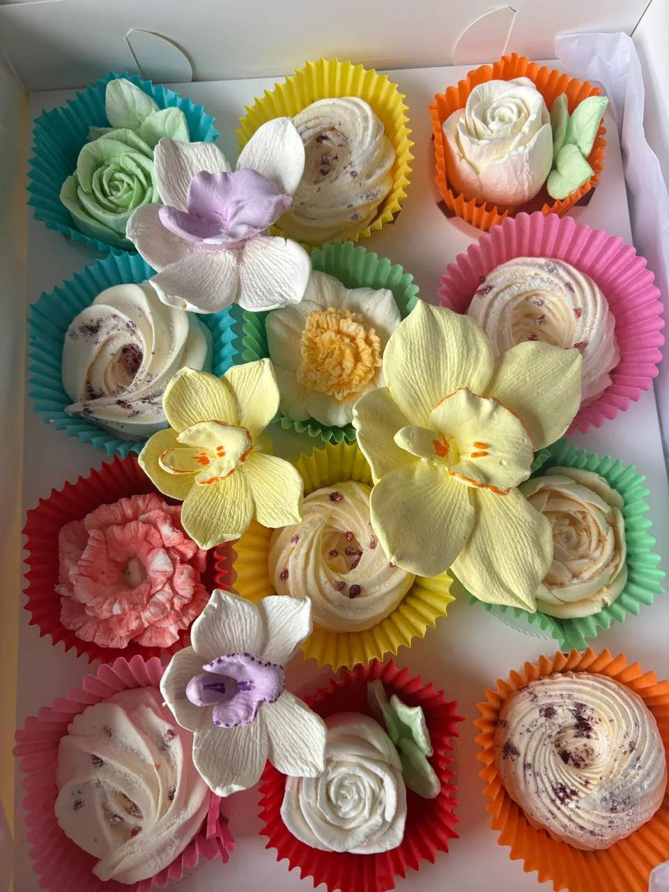 Colourful box of individual marshmallow flowers